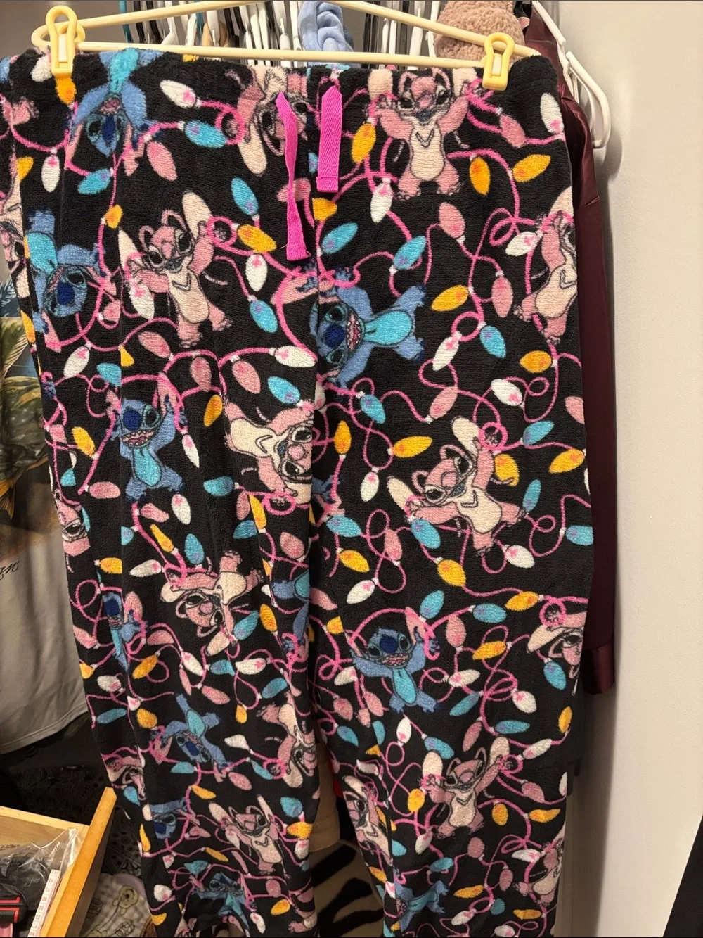 Disney Black Fleece Joggers with Pink Blue Yellow Holiday Lights